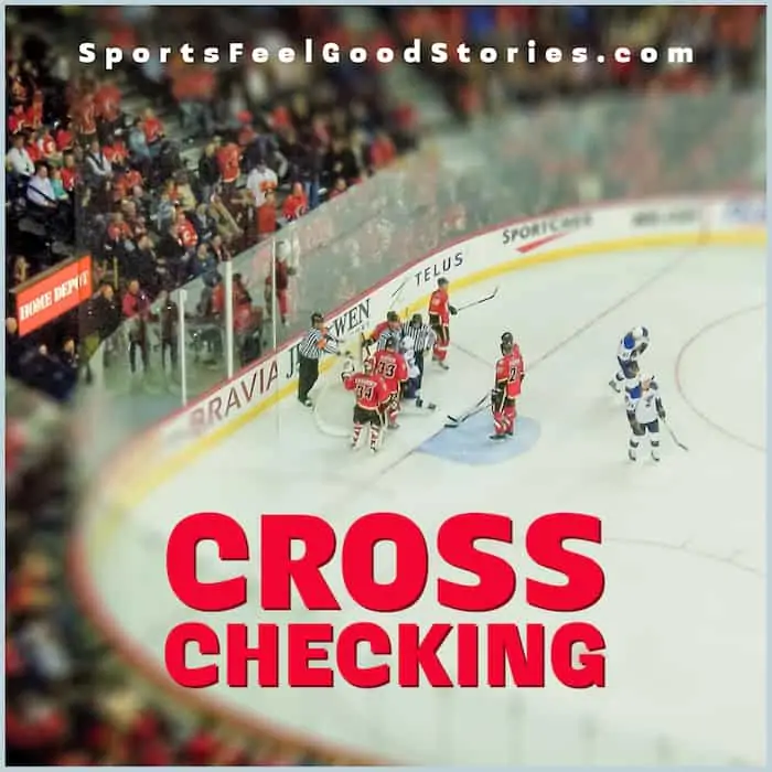 Cross-checking in hockey.